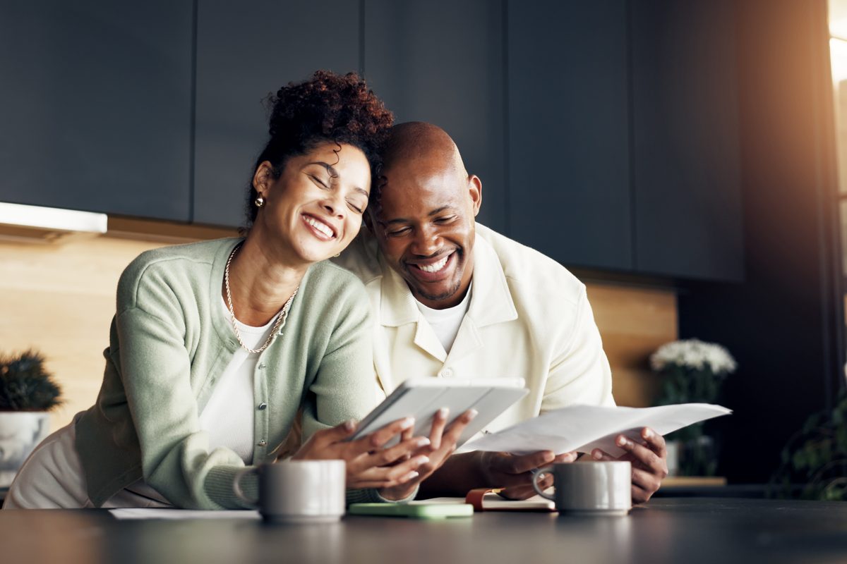 Couple reviewing paperwork together
